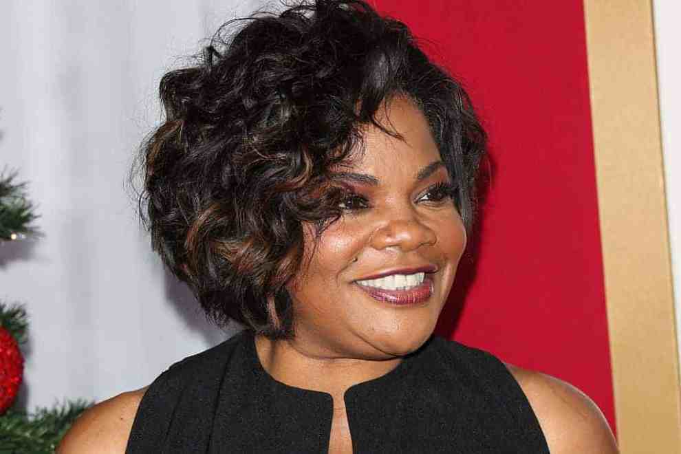 Mo'Nique smiling at the camera