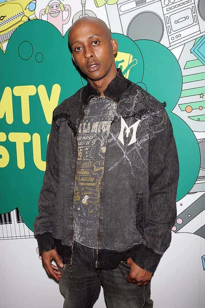 Gillie Da Kid wearing black