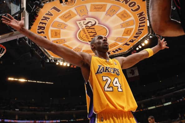 Kobe Bryant #24 of the Los Angeles Lakers plays defense against the Portland Trail Blazers on March 16