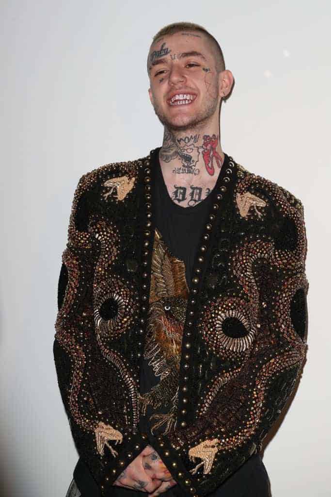 Lil Peep wearing black and brown suite