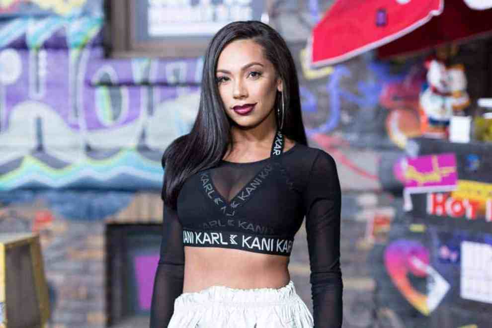 Erica Mena wearing black and white