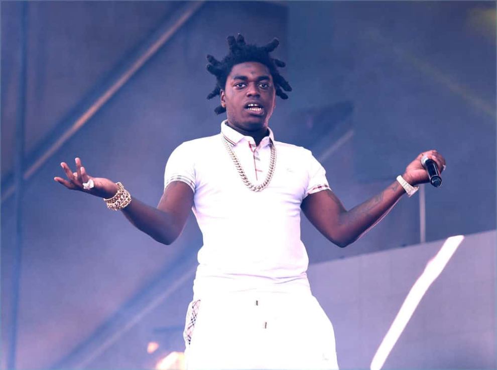 Kodak Black on stage wearing white