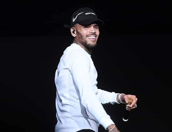 Singer Chris Brown performs onstage at 3rd Annual V-103 Winterfest Concert at Philips Arena on December 16