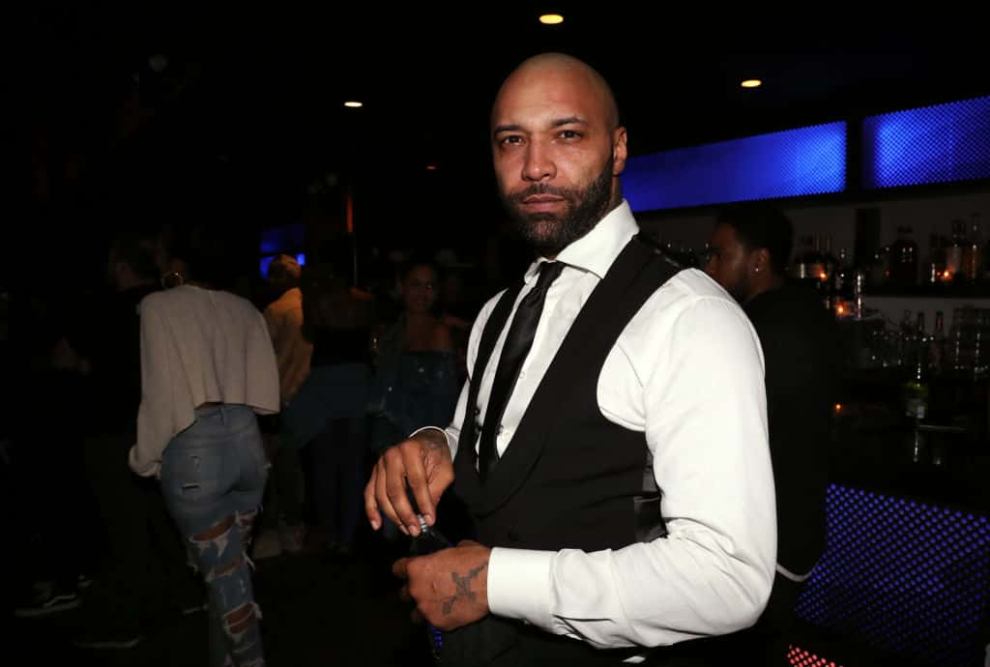 Joe Budden wearing black and white