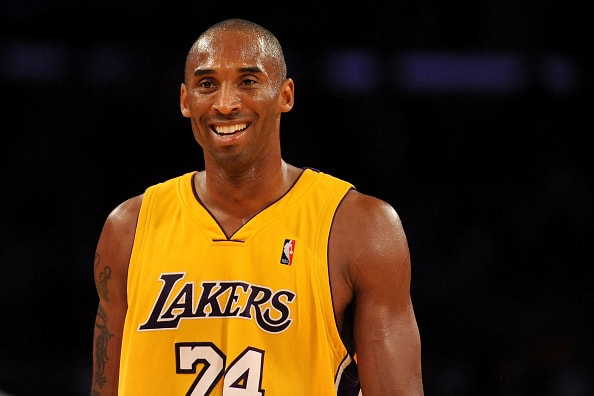 Kobe Bryant #24 of the Los Angeles Lakers smiles in the fourth quarter during the game against the Chicago Bulls on November 19