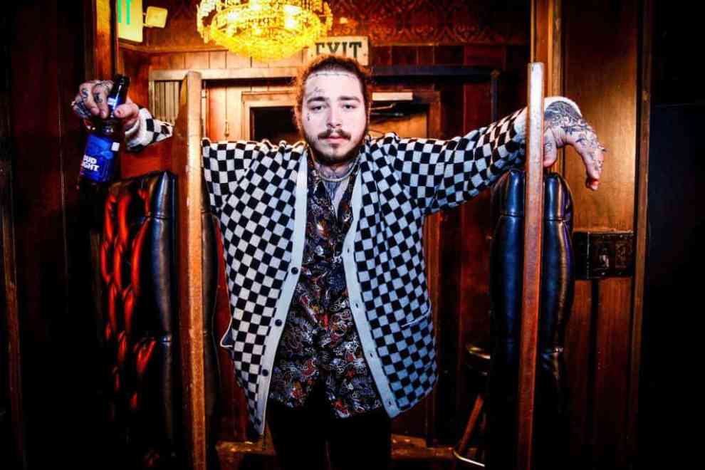 Post Malone wearing checkered jacket