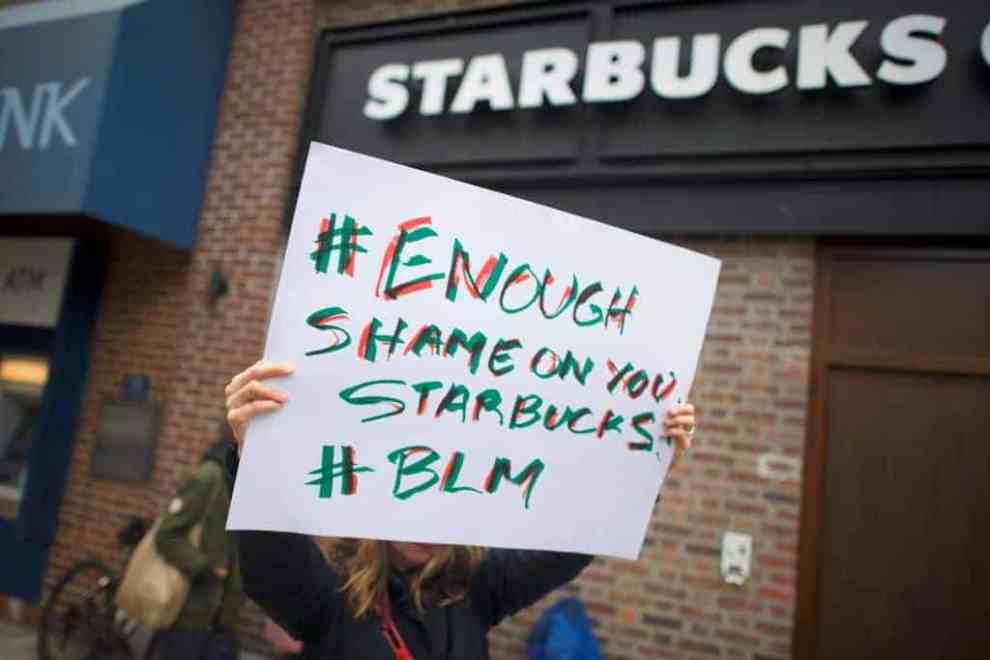 Starbucks protest "#Enough Shame on you Starbucks #BLM"