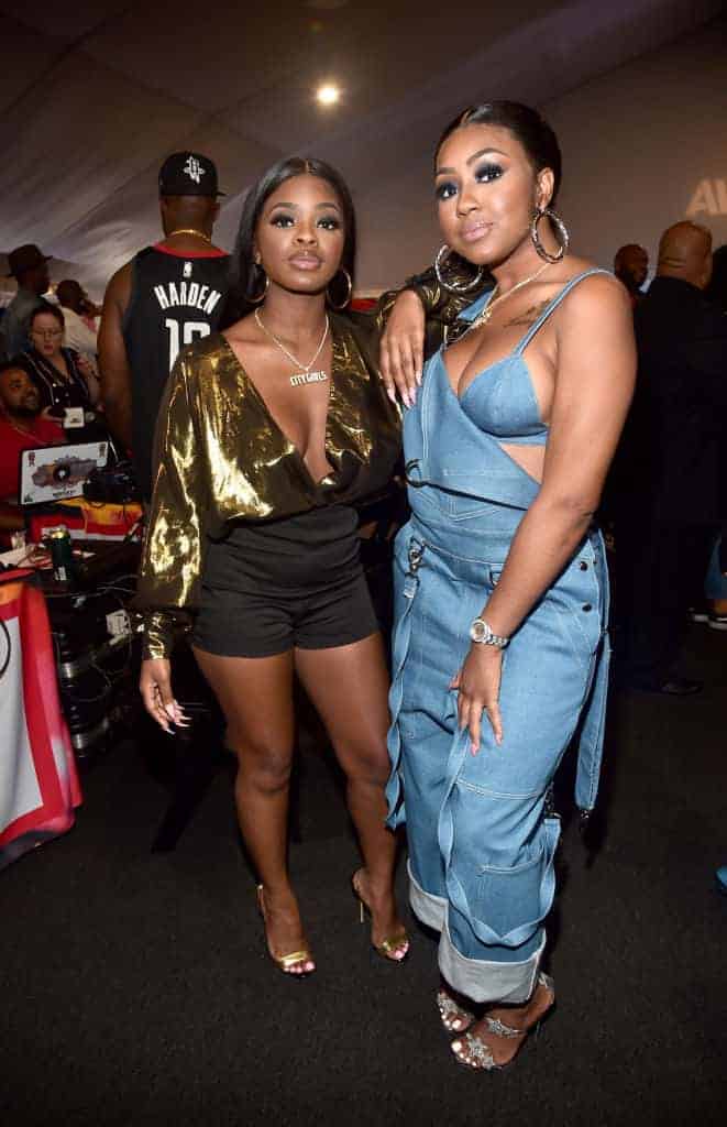 JT and Yung Miami wearing different colors