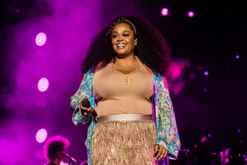 Jill Scott performing on stage