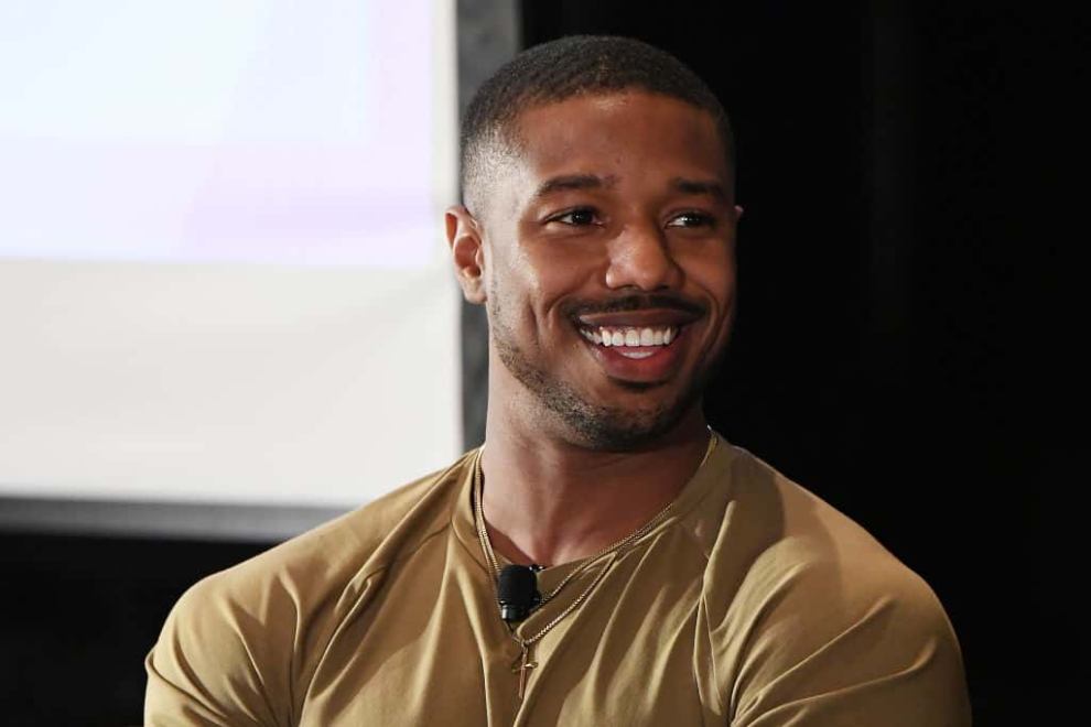 Michael B. Jordan speaks onstage during the 2018 Essence Festival