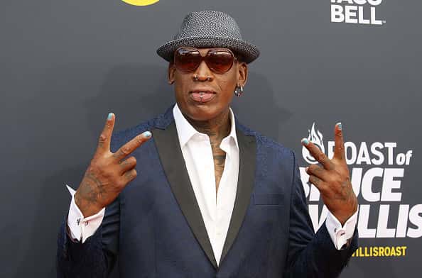 Dennis Rodman on red carpet.