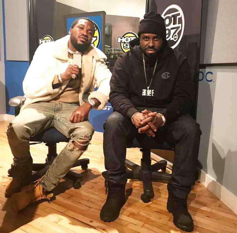 Meek Mill with a White coat Funk Flex in Black Hoodie in Hot 97 studio