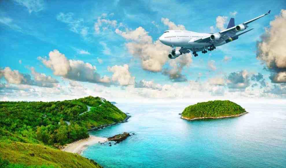 A plane flying over an island