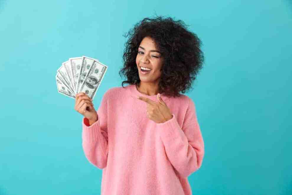 Woman holding money