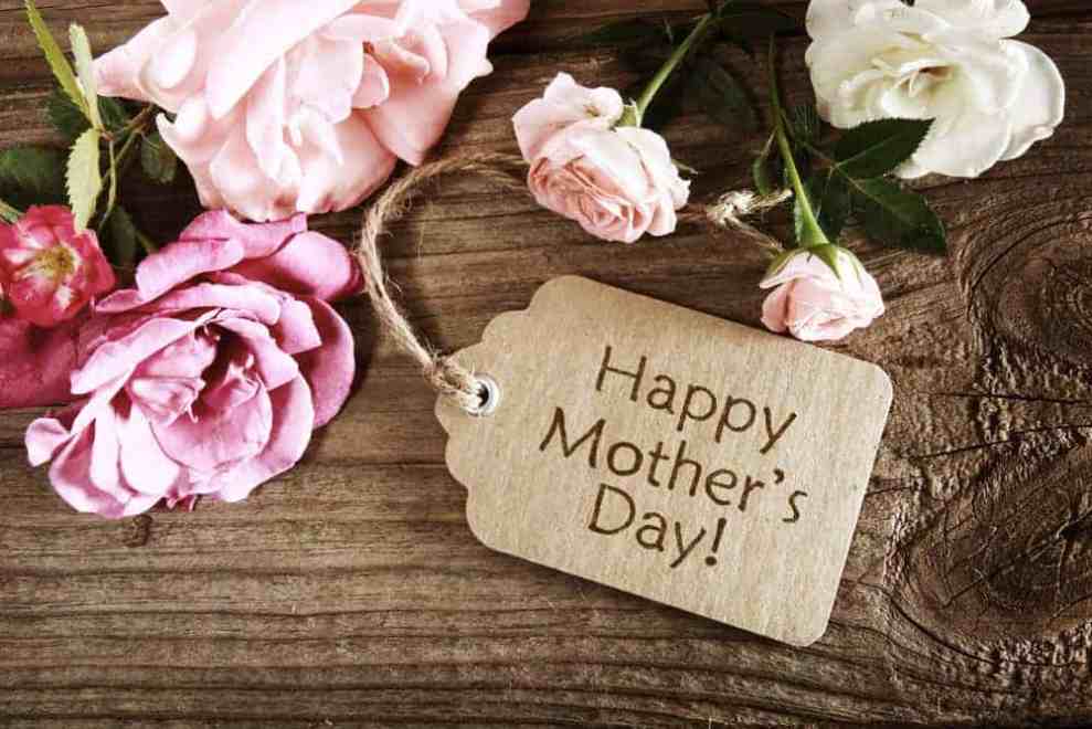 Happy Mothers day sign with pink flowers