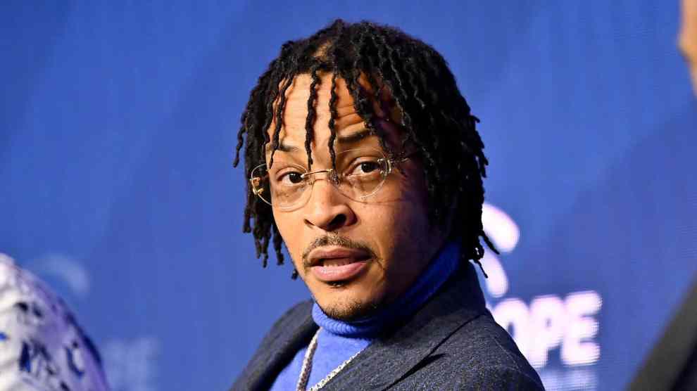 ATLANTA, GEORGIA - DECEMBER 13: T.I. on stage during the 9th Annual HOPE Global Forums at the Hyatt Regency Atlanta on December 13, 2022 in Atlanta, Georgia.