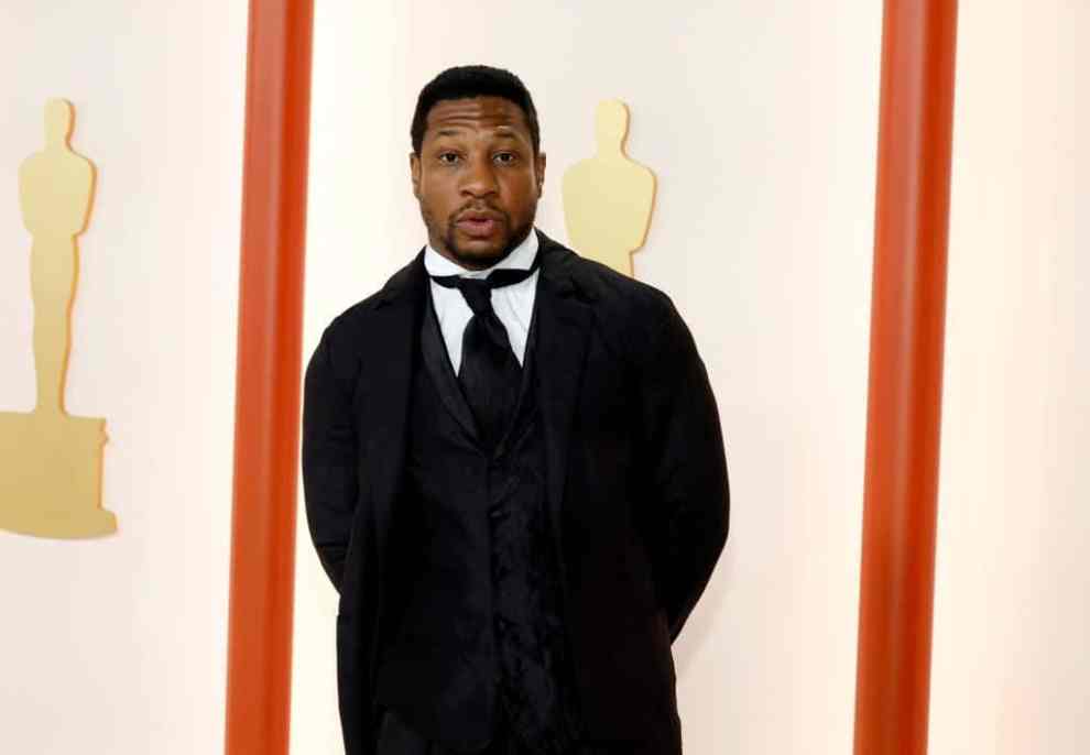 HOLLYWOOD, CALIFORNIA - MARCH 12: Jonathan Majors attends the 95th Annual Academy Awards on March 12, 2023 in Hollywood, California.