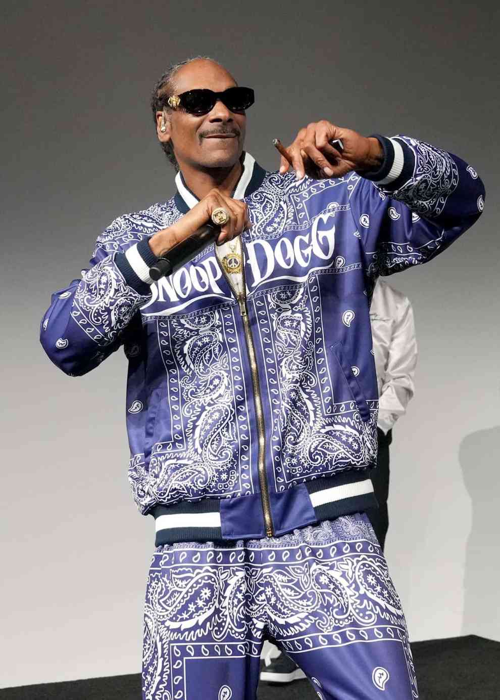 LOS ANGELES, CALIFORNIA - JUNE 24: Snoop Dogg (L) performs onstage during the 106 & Park segment at House of BET - Day 3 at Goya Studios on June 24, 2023 in Los Angeles, California.