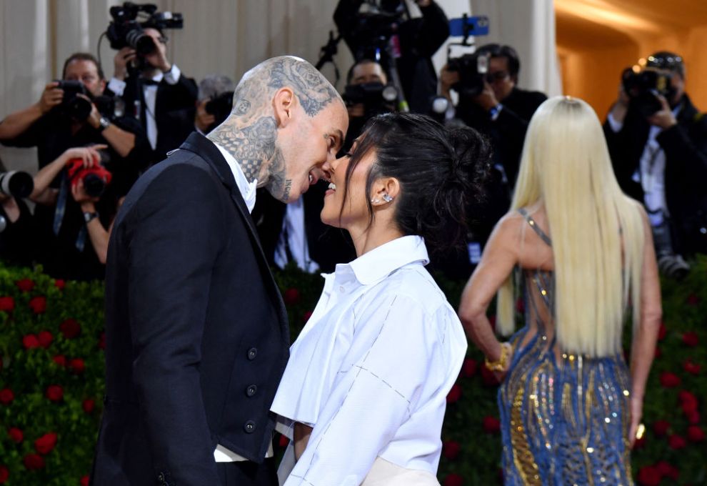 US socialite Kourtney Kardashian and US musician Travis Barker arrive for the 2022 Met Gala at the Metropolitan Museum of Art on May 2, 2022, in New York. The Gala raises money for the Metropolitan Museum of Art's Costume Institute. The Gala's 2022 theme is "In America: An Anthology of Fashion"