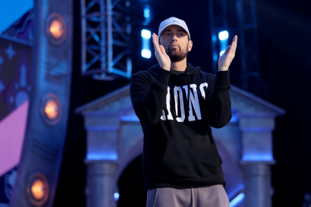 Rapper Marshall "Eminem" Mathers claps during the first round of the 2024 NFL Draft at Campus Martius Park and Hart Plaza on April 25, 2024 in Detroit, Michigan.