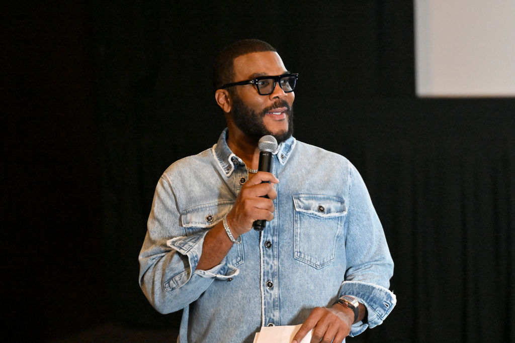 Tyler Perry Makes It Rain On Dancer At Usher Concert