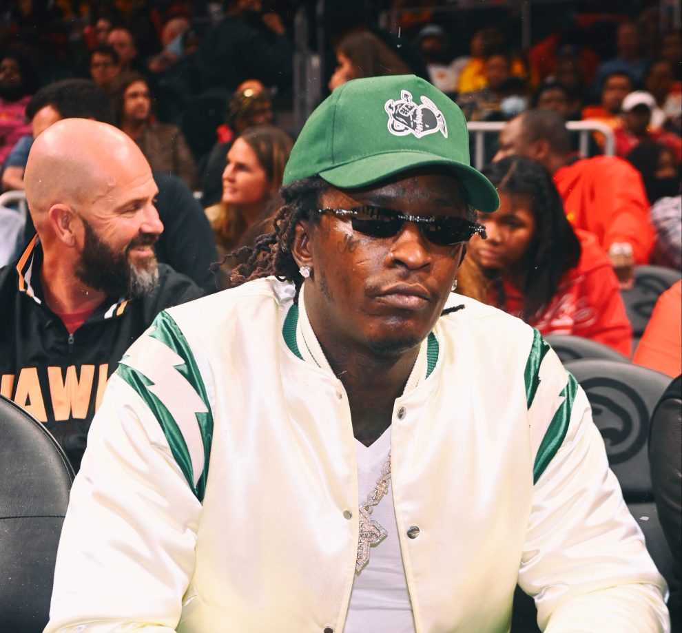 ATLANTA, GEORGIA - MARCH 25: Rapper Young Thug attends the game between Golden State Warriors and the Atlanta Hawks at State Farm Arena on March 25, 2022 in Atlanta, Georgia. (Photo by Paras Griffin/Getty Images)