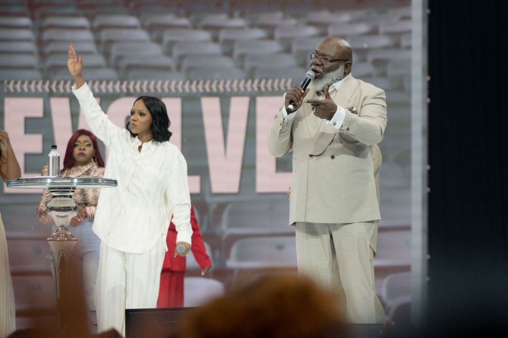 Pastor Sarah Jakes Roberts and T.D. Jakes speak on stage during the Woman Evolve 2023 day 3 at Globe Life Field on September 16, 2023 in Arlington, Texas.