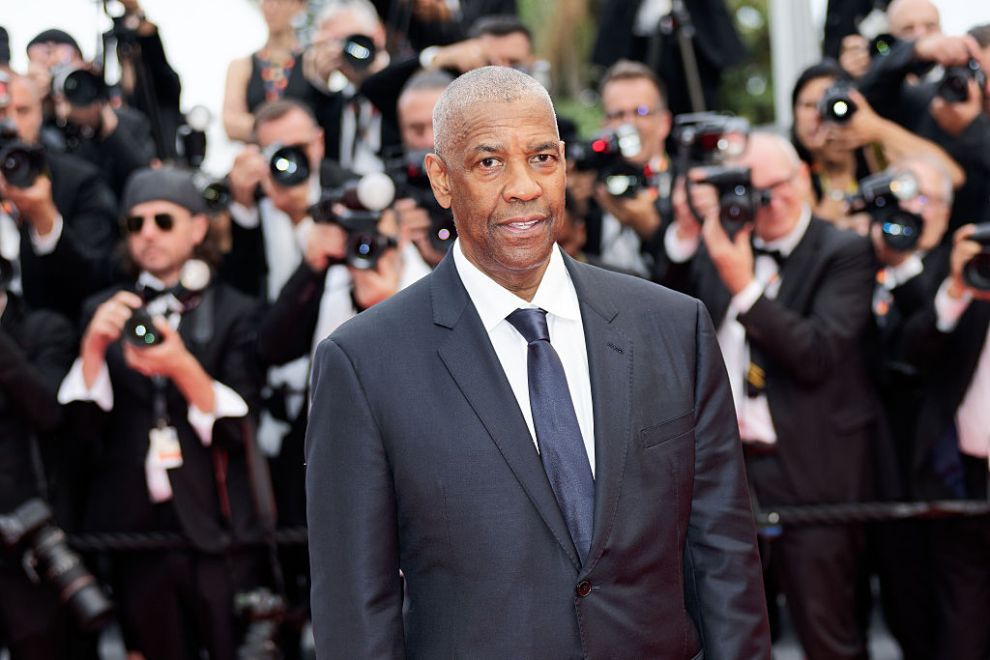 Denzel Washington attends the "Highest 2 Lowest" red carpet at the 78th annual Cannes Film Festival at Palais des Festivals on May 19, 2025 in Cannes, France.