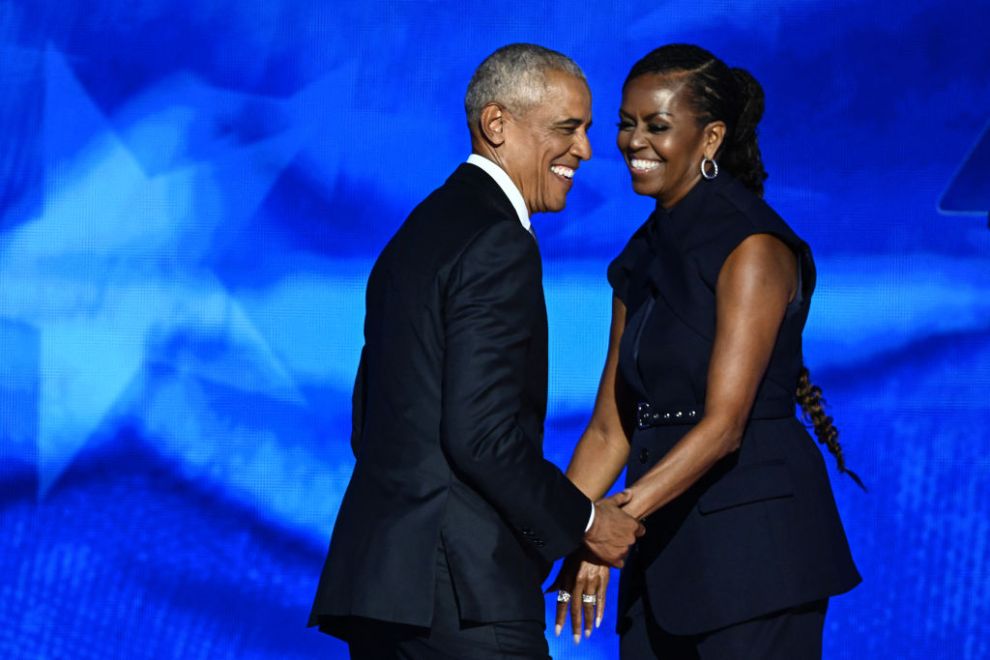Former US President Barack Obama arrives onstage after his wife and former First Lady Michelle Obama introduced him on the second day of the Democratic National Convention (DNC) at the United Center in Chicago, Illinois, on August 20, 2024. Vice President Kamala Harris will formally accept the party's nomination for president at the DNC which runs from August 19-22 in Chicago.